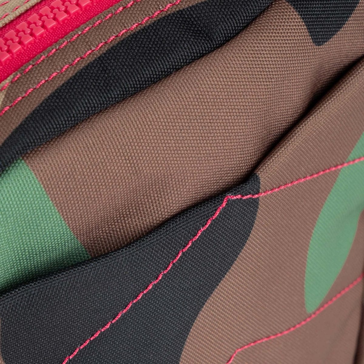 Bond Vintage Camo Recycled Canvas Crossbody Bag in by Roka London